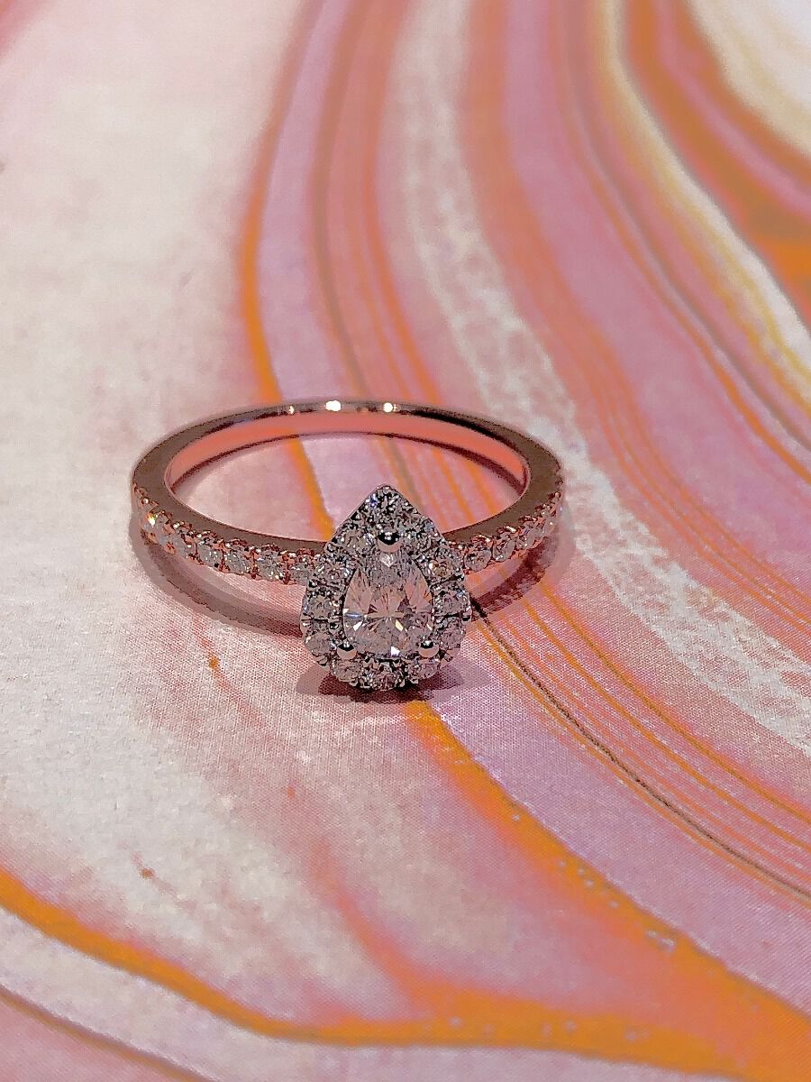 Rose gold pear sale shaped halo engagement ring